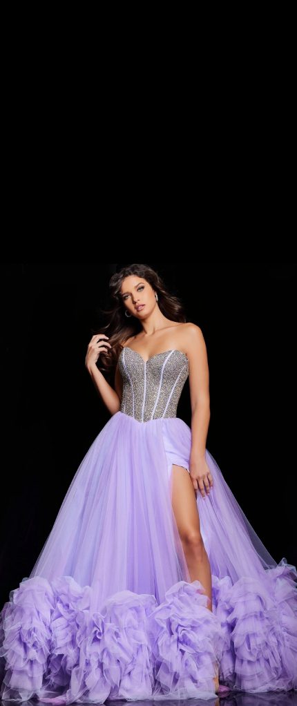 Model wearing a blue gown. Mobile image