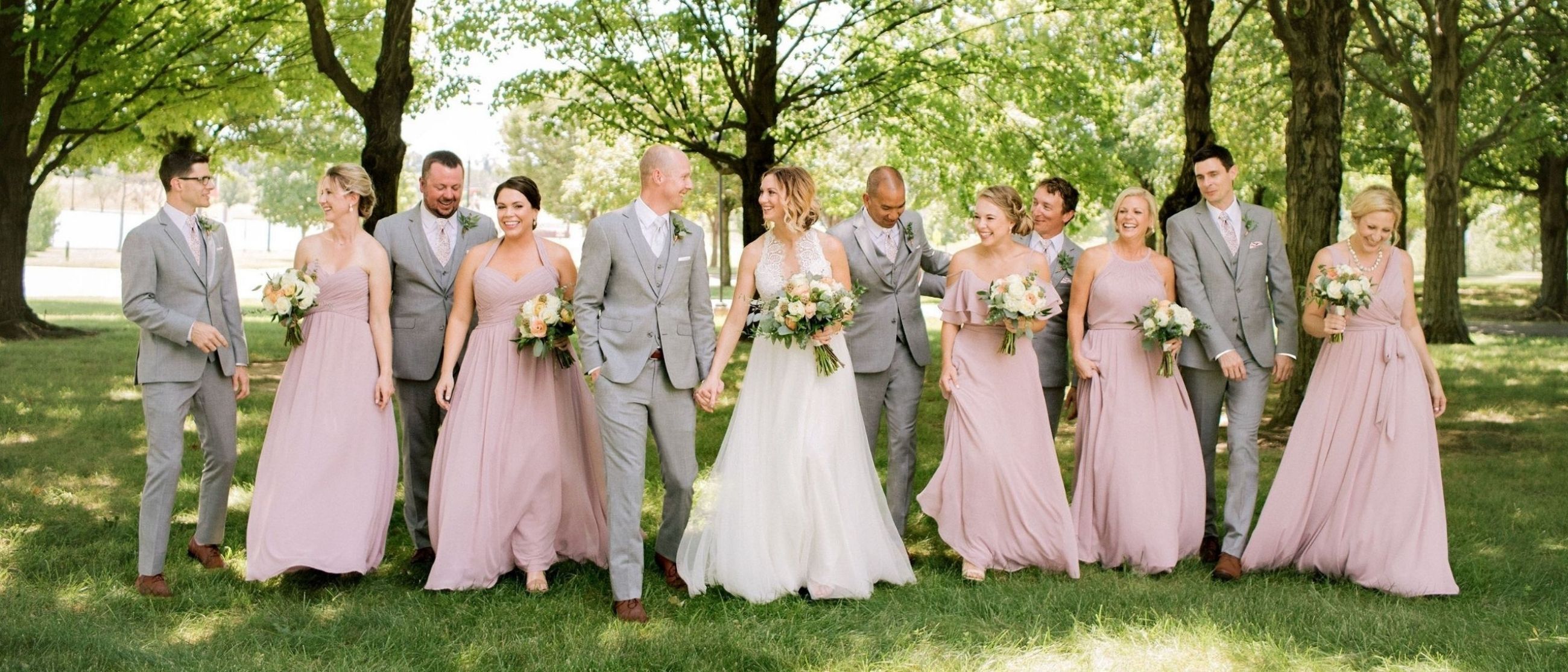 Models wearing a gowns and a suits